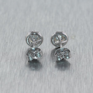 Modern 14k White Gold 0.65ctw Diamond Halo Stud Earrings