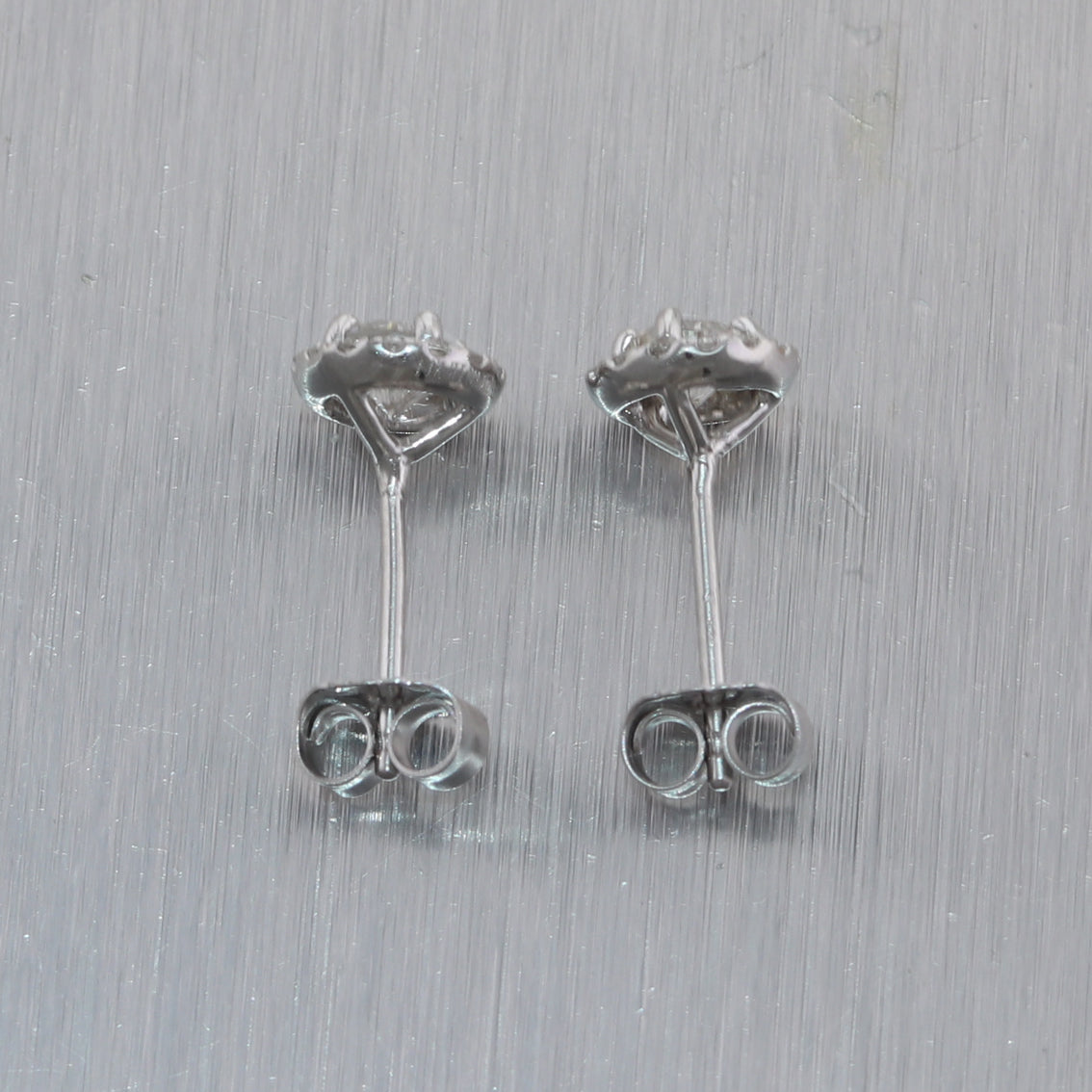 Modern 14k White Gold 0.65ctw Diamond Halo Stud Earrings