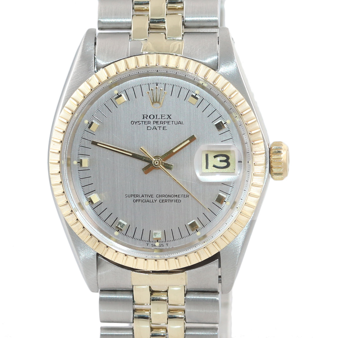 ROLEX 34mm 14kt Gold Date Engine Turned Bezel Silver Index Dial